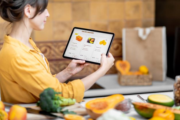 woman-shopping-online-using-digital-tablet-2021